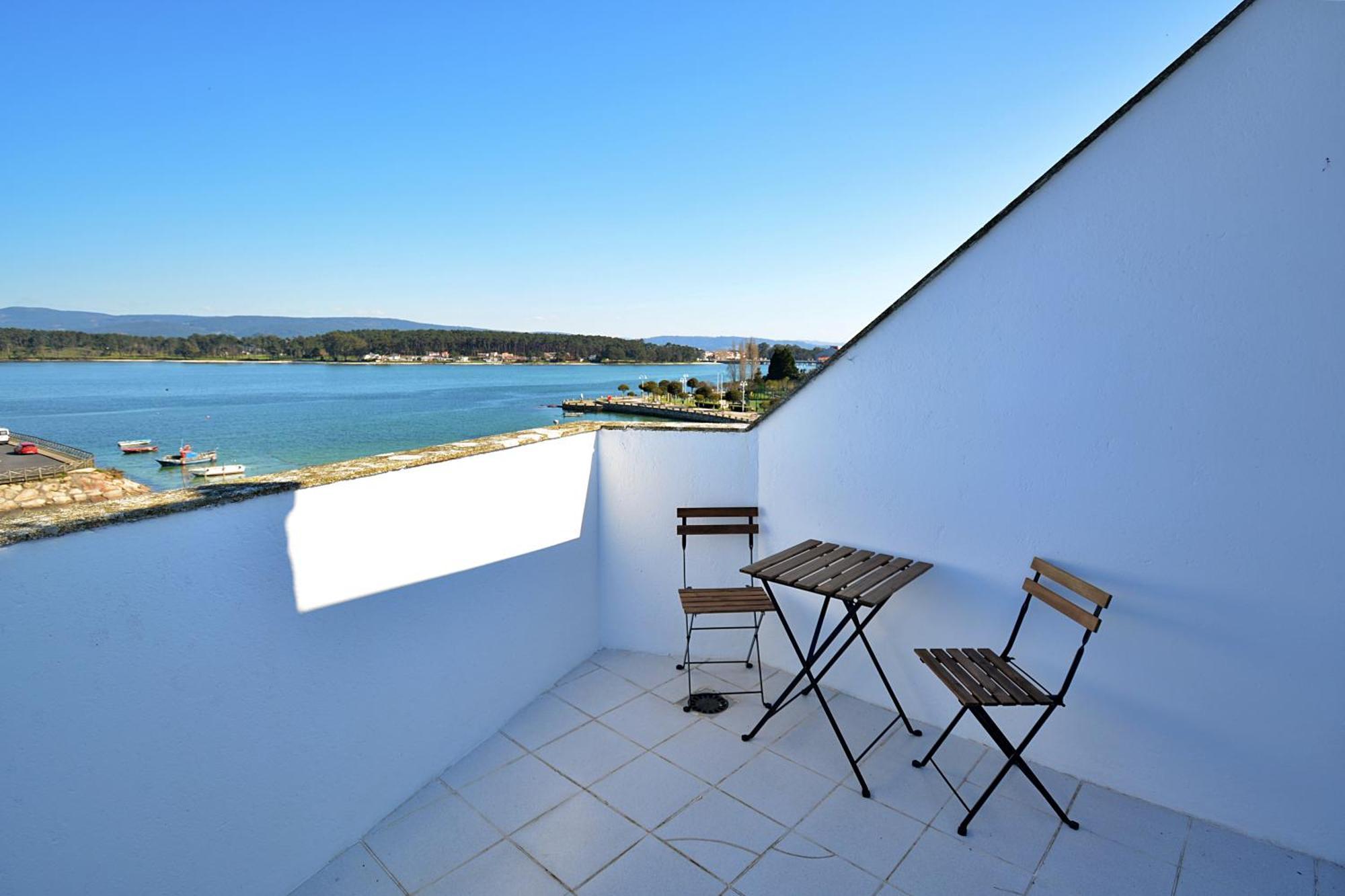 Apartamento Con Terraza Frente Al Mar En O Grove Bagian luar foto